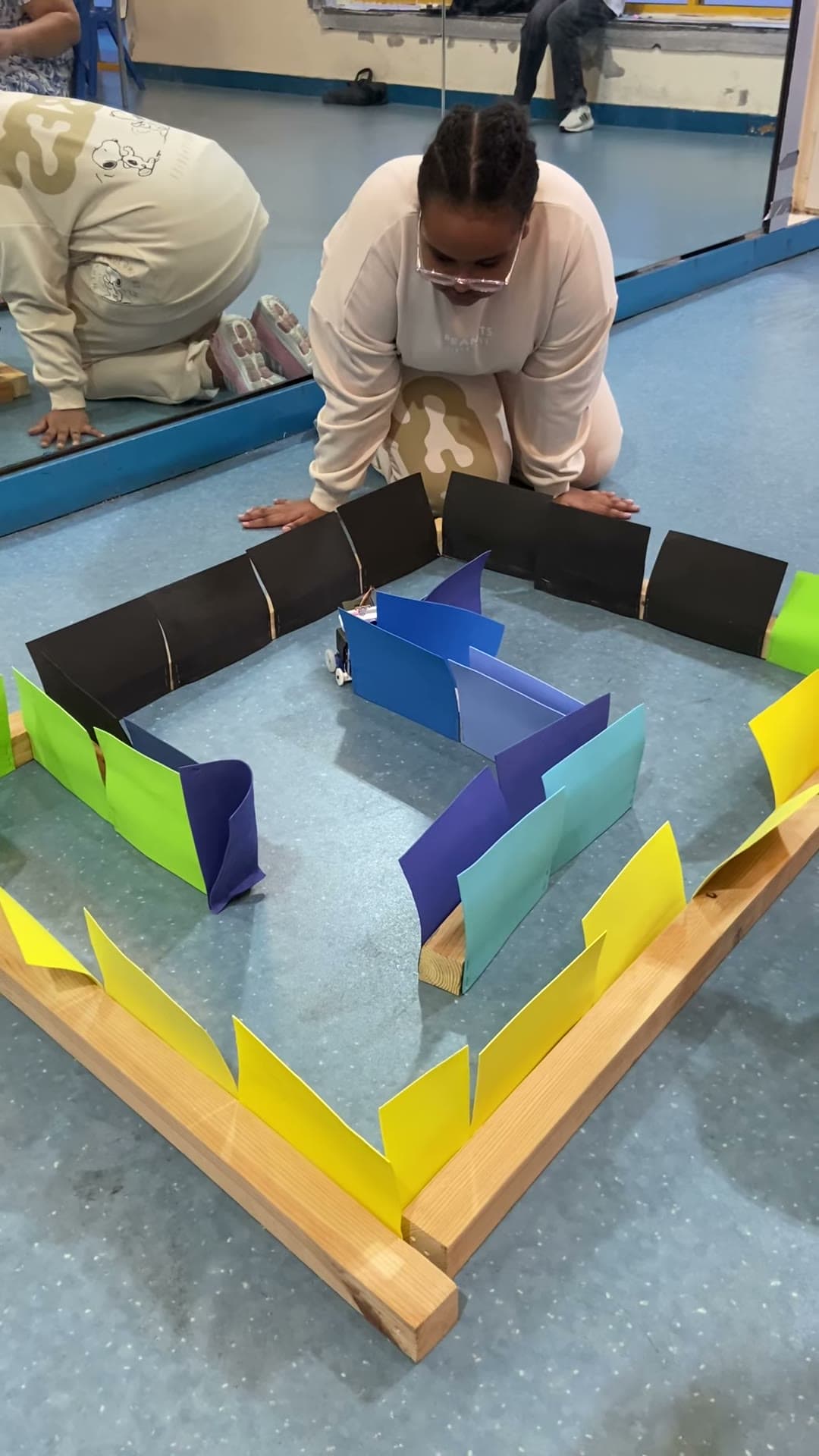 Robot testing route through a colorful maze course
