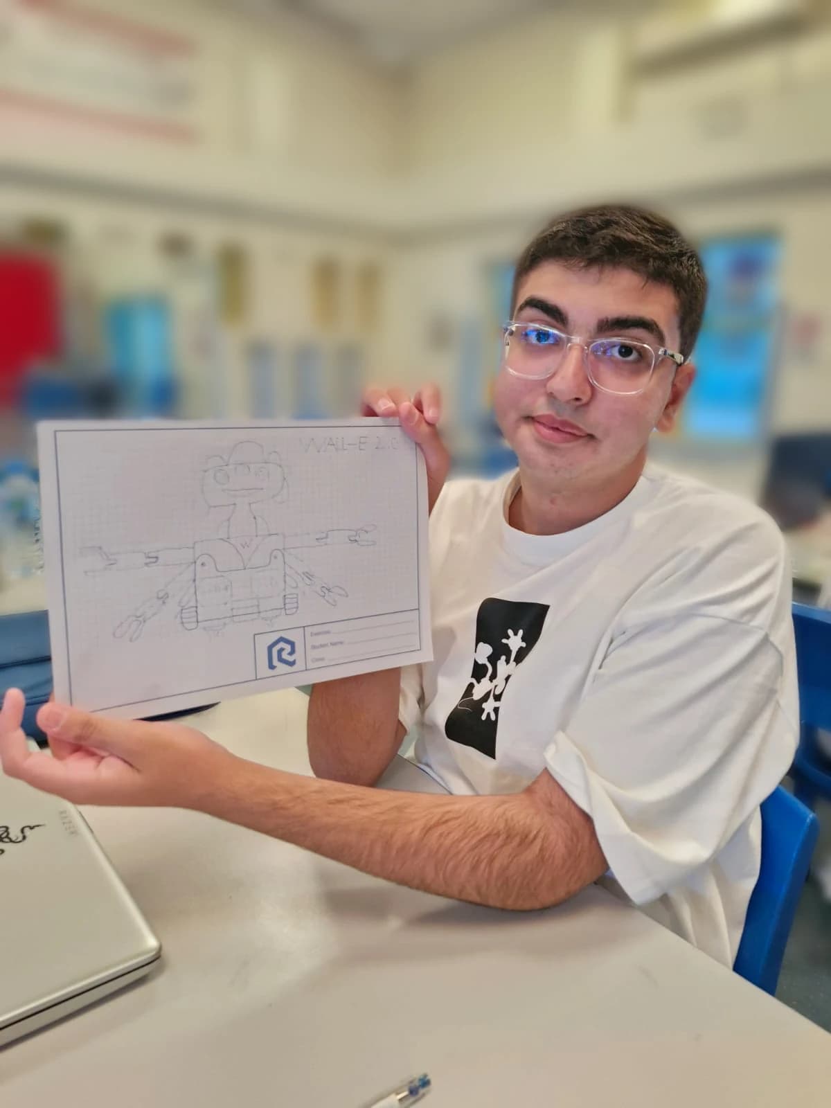 Student presenting a Wall-E-inspired design